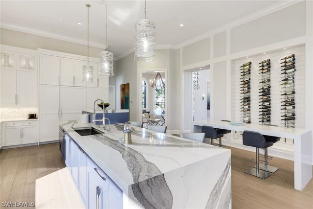 12924 Bald Cypress LN, Naples, FL 34119