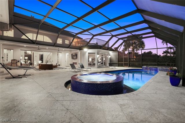 12924 Bald Cypress LN, Naples, FL 34119