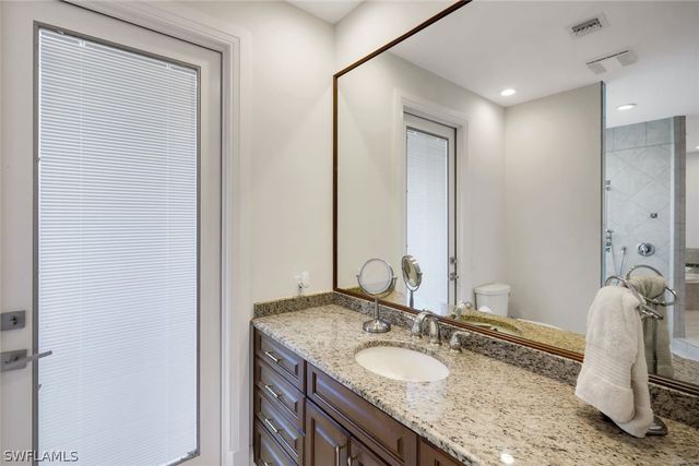 12924 Bald Cypress LN, Naples, FL 34119