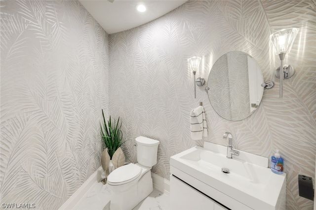 12924 Bald Cypress LN, Naples, FL 34119