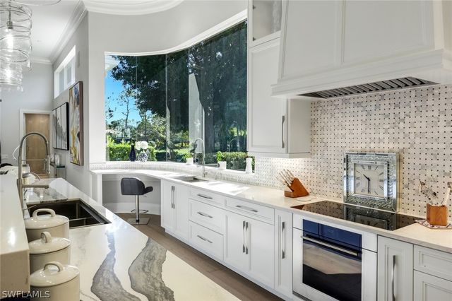 12924 Bald Cypress LN, Naples, FL 34119