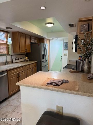 9626 E Navajo Place, Sun Lakes, AZ 85248