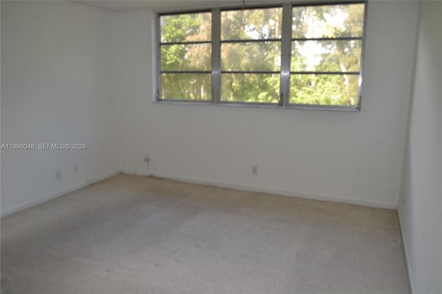 300 S Hollybrook Dr 203, Pembroke Pines, FL 33025