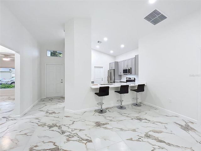 11148 PINEWOOD COVE LANE, Orlando, FL 32817