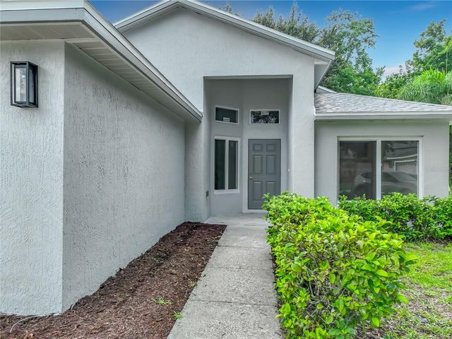 11148 PINEWOOD COVE LANE, Orlando, FL 32817