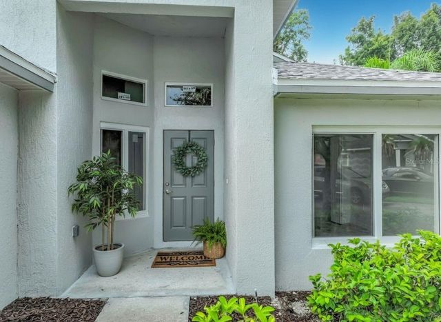 11148 PINEWOOD COVE LANE, Orlando, FL 32817