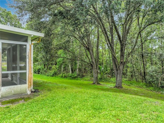 11148 PINEWOOD COVE LANE, Orlando, FL 32817