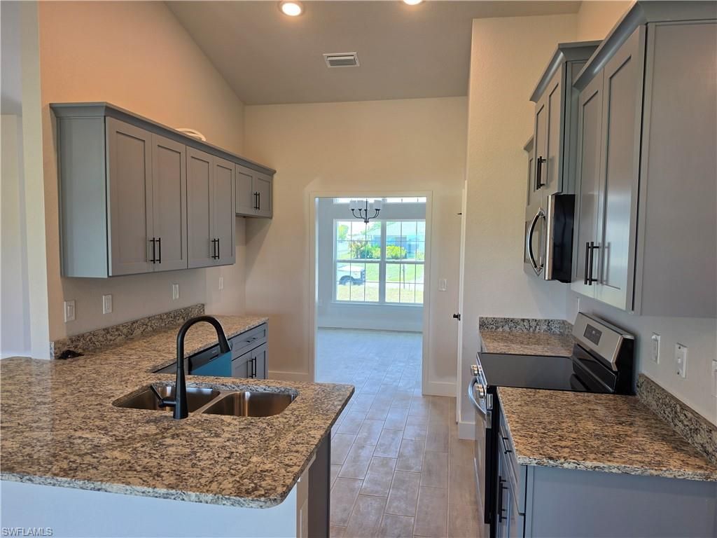 925 NW 8th PL, CAPE CORAL, FL 33993 — photo 3