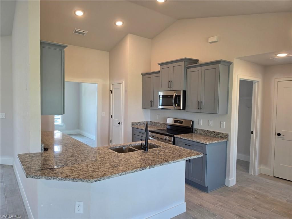 925 NW 8th PL, CAPE CORAL, FL 33993 — photo 4