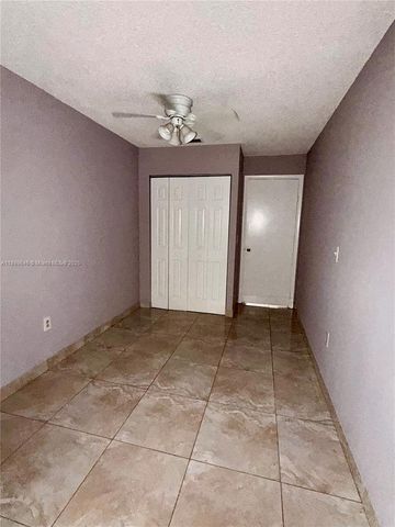 5797 S 37th St, Green Acres, FL 33463