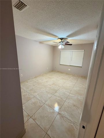 5797 S 37th St, Green Acres, FL 33463