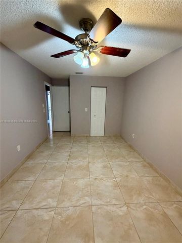 5797 S 37th St, Green Acres, FL 33463