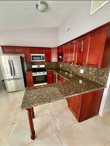 5797 S 37th St, Green Acres, FL 33463