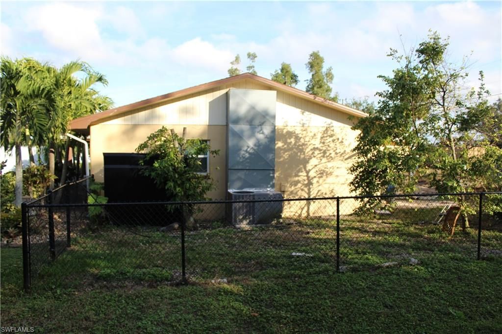 679 Canal DR, NORTH FORT MYERS, FL 33903 — photo 4