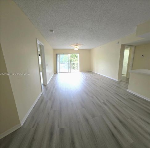 5051 Wiles Rd 201, Coconut Creek, FL 33073