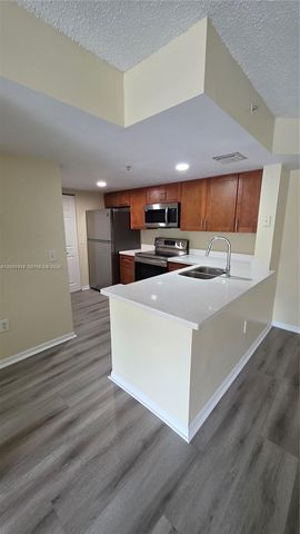 5051 Wiles Rd 201, Coconut Creek, FL 33073