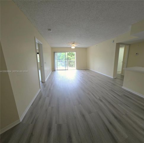 5051 Wiles Rd 201, Coconut Creek, FL 33073