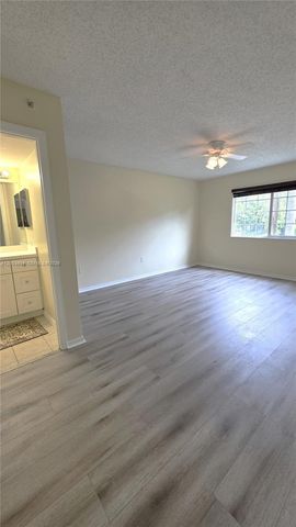 5051 Wiles Rd 201, Coconut Creek, FL 33073