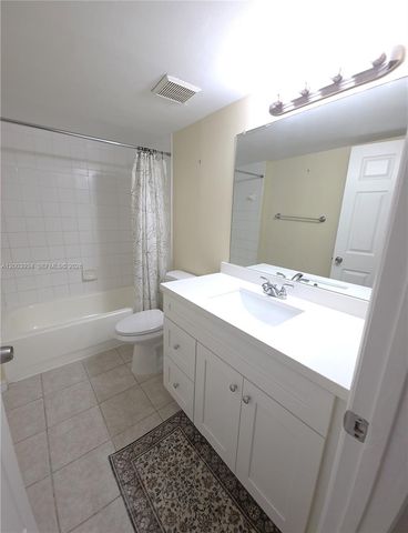 5051 Wiles Rd 201, Coconut Creek, FL 33073