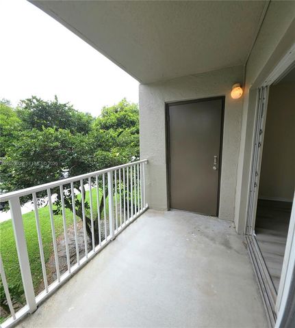 5051 Wiles Rd 201, Coconut Creek, FL 33073