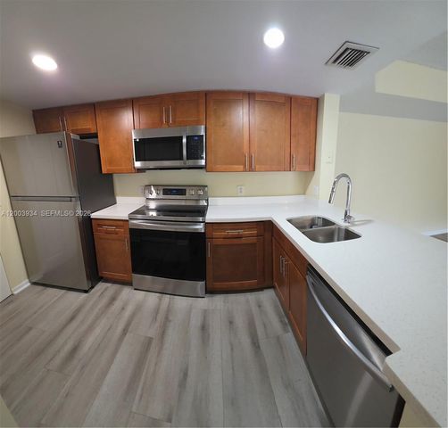 5051 Wiles Rd 201, Coconut Creek, FL 33073