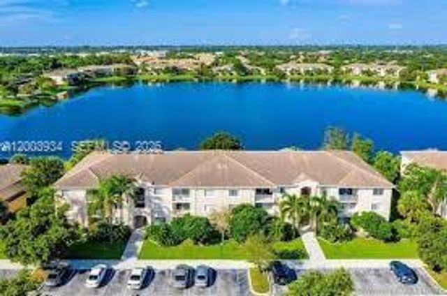 5051 Wiles Rd 201, Coconut Creek, FL 33073