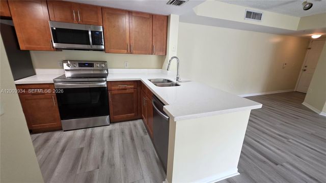 5051 Wiles Rd 201, Coconut Creek, FL 33073