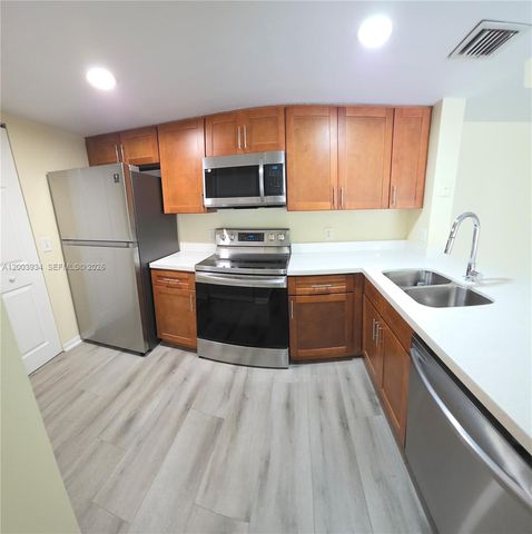 5051 Wiles Rd 201, Coconut Creek, FL 33073