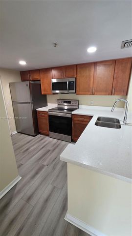 5051 Wiles Rd 201, Coconut Creek, FL 33073