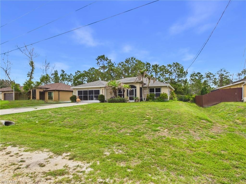1858 Marlboro LN, LEHIGH ACRES, FL 33972 — exterior