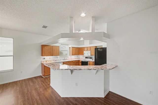 512 GRAND VISTA TRAIL, Leesburg, FL 34748