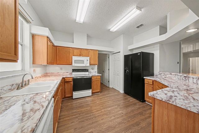 512 GRAND VISTA TRAIL, Leesburg, FL 34748