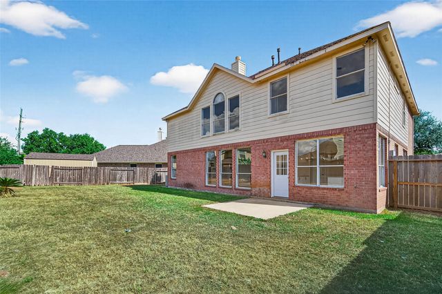 21310 Timber Pines Drive, Spring, TX 77388