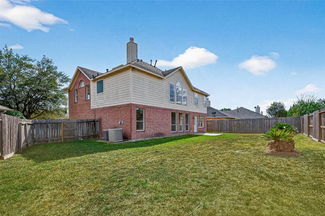 21310 Timber Pines Drive, Spring, TX 77388