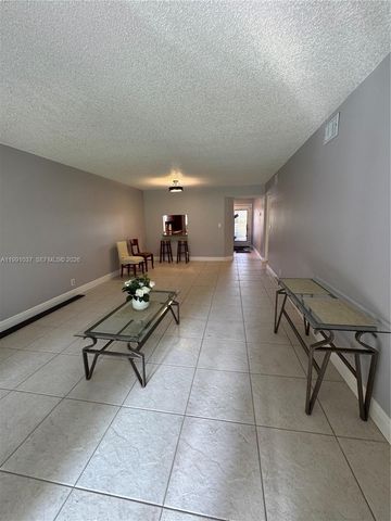 6095 N Sabal Palm Boulevard 104, Tamarac, FL 33319