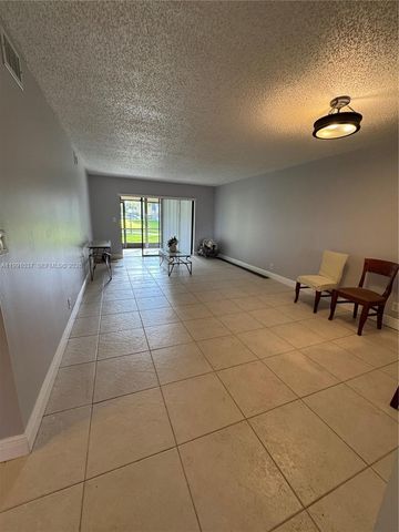 6095 N Sabal Palm Boulevard 104, Tamarac, FL 33319