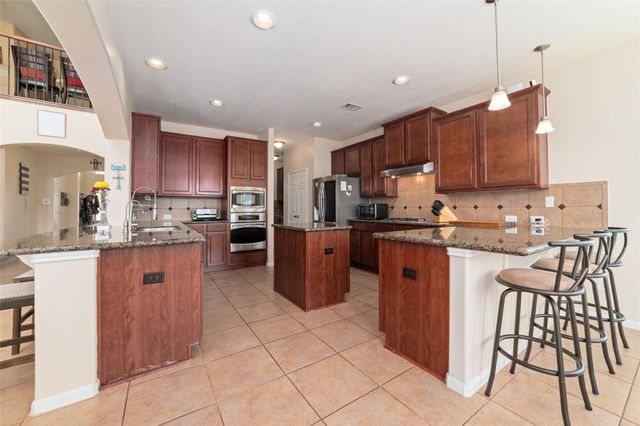 25126 Waterstone Estates Circle E, Tomball, TX 77375