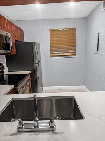 10313 NW 8th St 205, Pembroke Pines, FL 33026