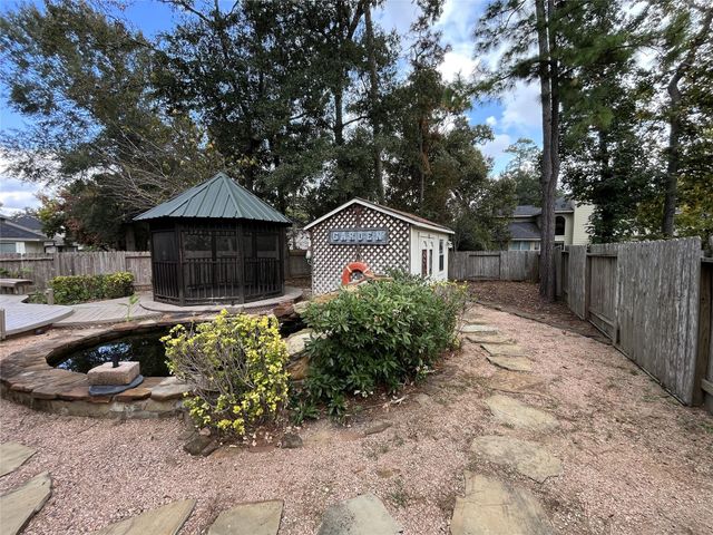 30 S Rambling Ridge Place, Conroe, TX 77385