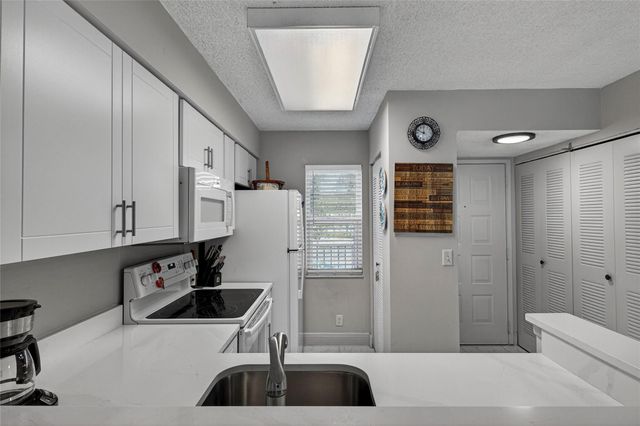 2222 N Cypress Bend Drive 201, Pompano Beach, FL 33069