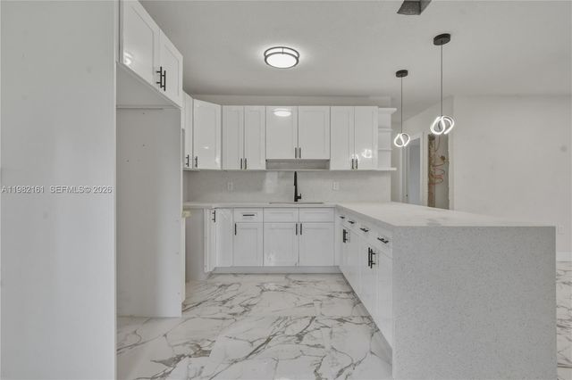 513 NW 99th St, Miami, FL 33150