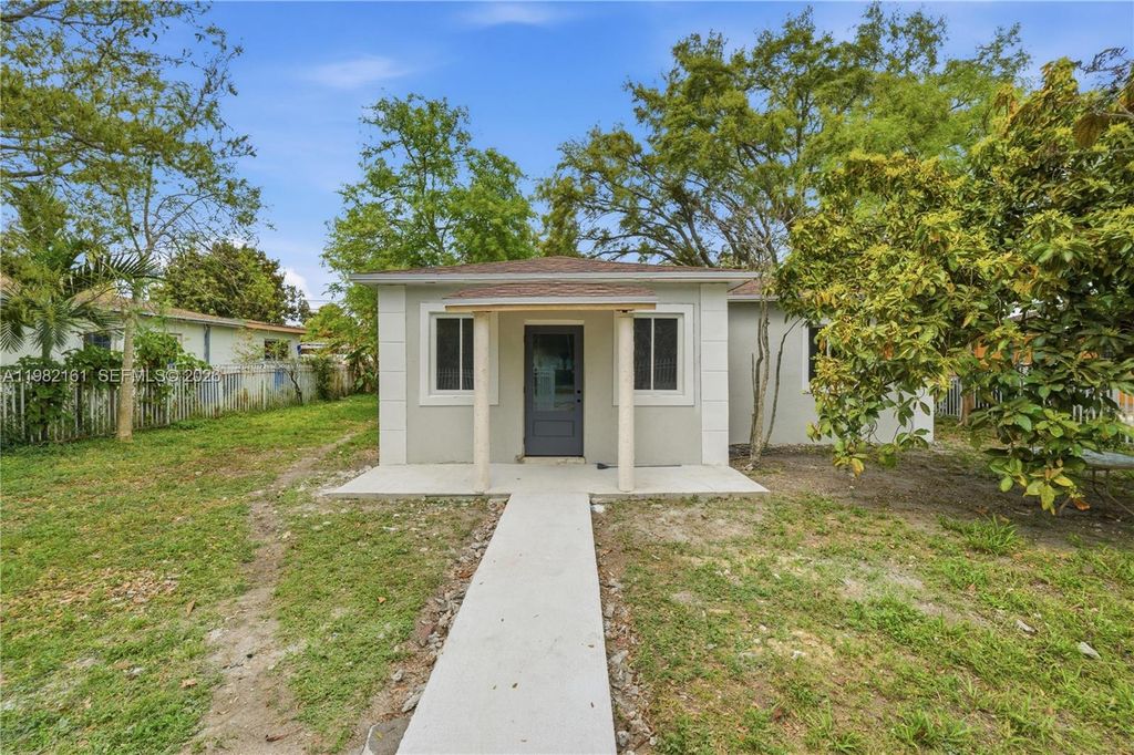 Image 1 of property listing at 513 NW 99th St, Miami, FL 33150