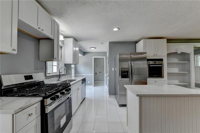 4875 Five Forks Trickum Road SW, Lilburn, GA 30047
