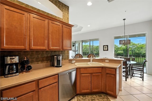 10080 Valiant CT 202, Miromar Lakes, FL 33913