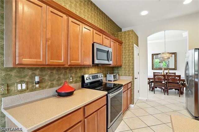 10080 Valiant CT 202, Miromar Lakes, FL 33913