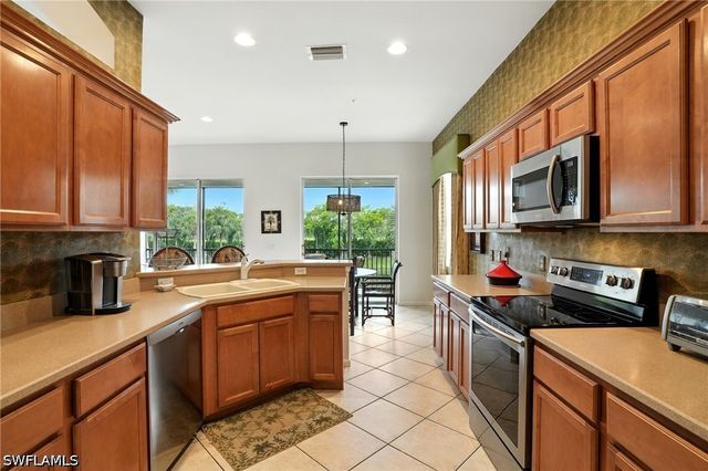 10080 Valiant CT 202, Miromar Lakes, FL 33913