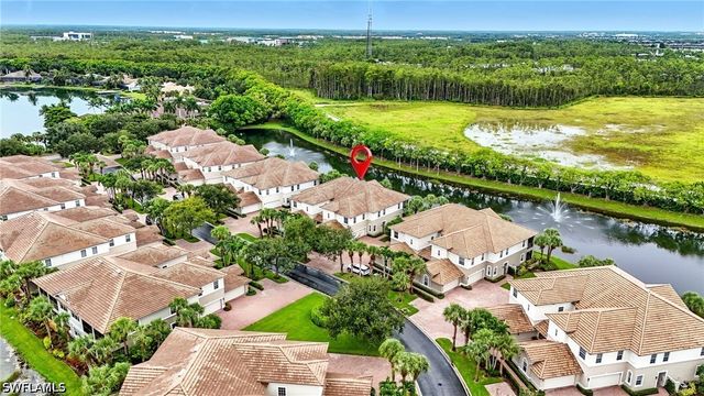 10080 Valiant CT 202, Miromar Lakes, FL 33913