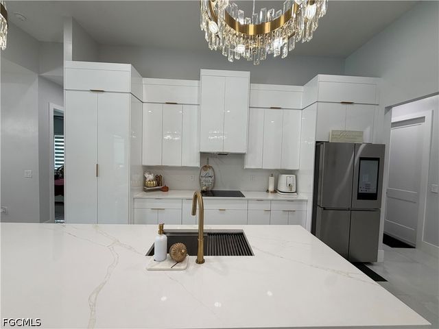 910 VENICE AVE N, Lehigh Acres, FL 33971