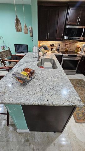 7252 Woodmont Avenue, Tamarac, FL 33321