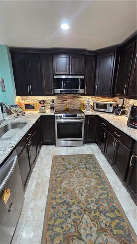 7252 Woodmont Avenue, Tamarac, FL 33321